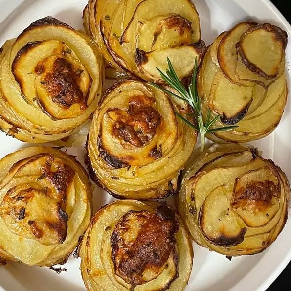 SLICE POTATOES AND PUT THEM IN A PAN